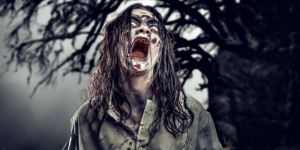 zombie woman with long hair snarling at the camera