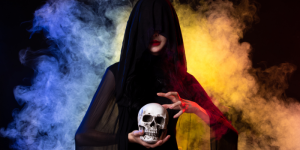 Witch holding skeleton