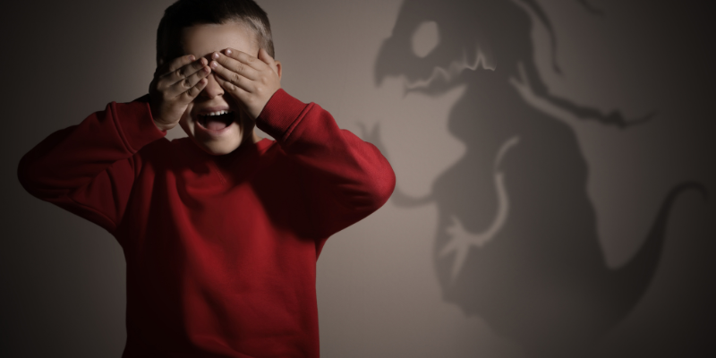 young boy scared by shadow