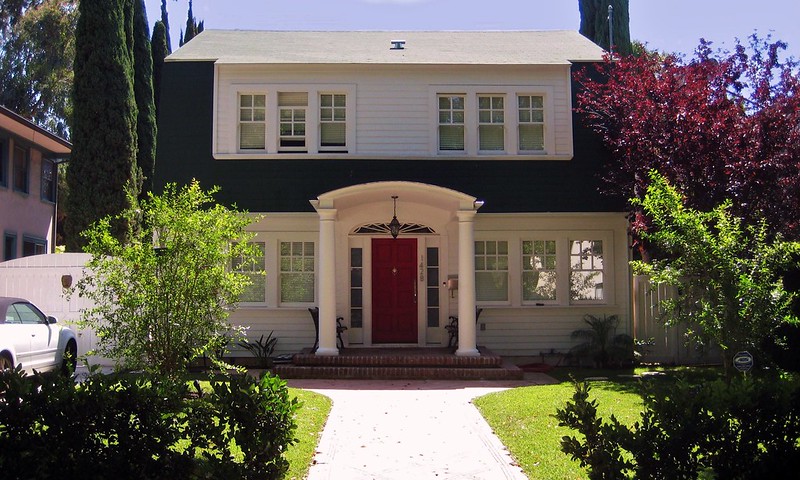 The house used as "1428 Elm Street" from the film "A Nightmare on Elm Street." The house has white paneling and a red door.