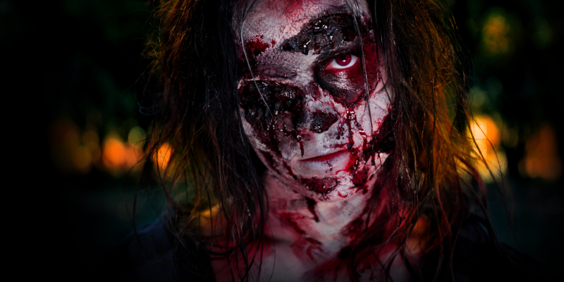 Scary Bloody Girl Zombie on Dark Background